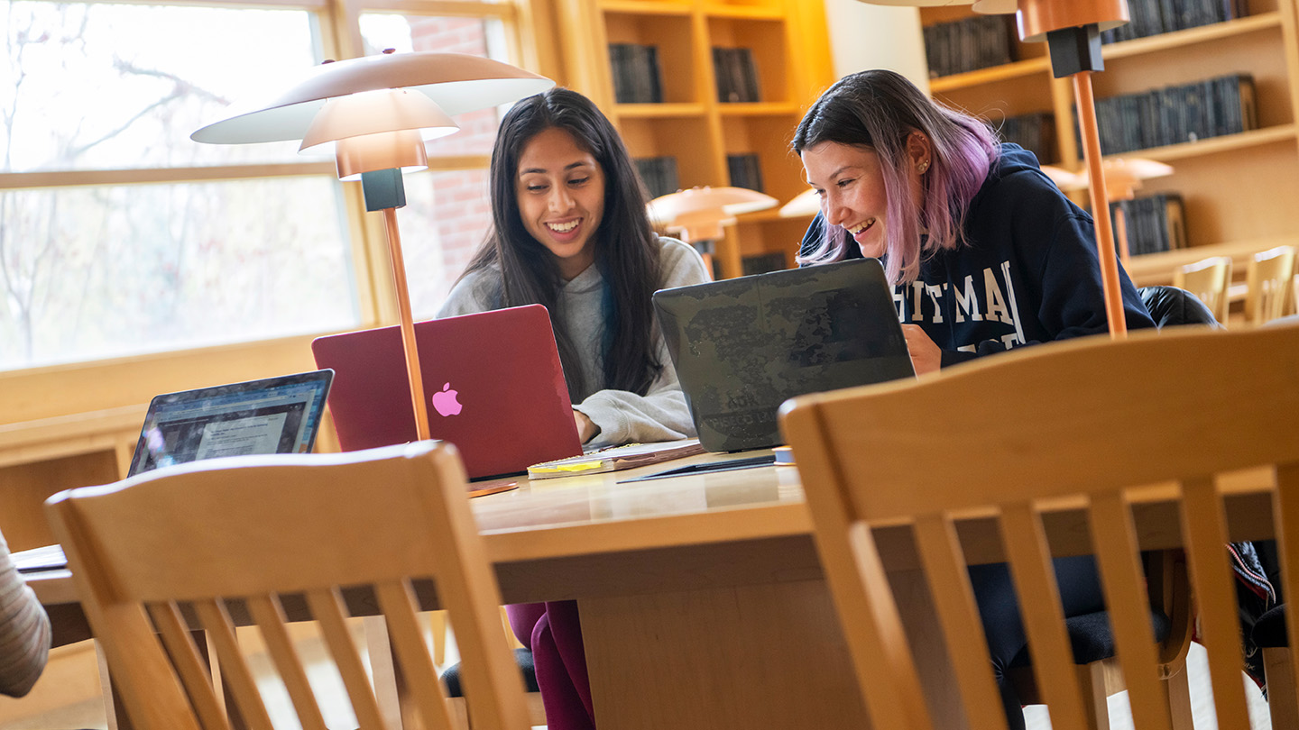 Students in penrose library studying