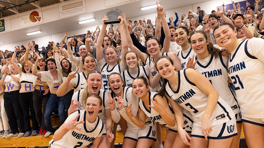 The home crowd loudly cheering after the Whitman Blues win the 2025 Northwest Conference Women’s Basketball Tournament.