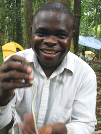 man holding a snake