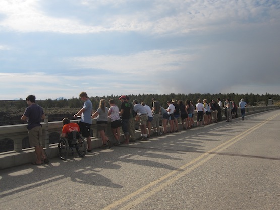 Students looking over a bridge railing on Fall Regional, 2011