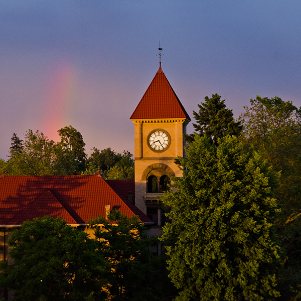 memorial building in the evening with a rainbow