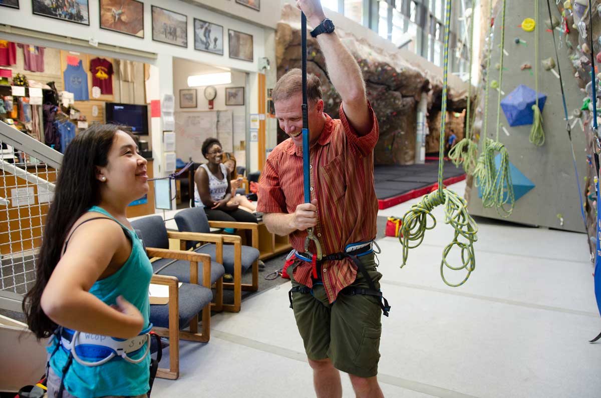 Daphne Gallegos gets climbing pointers from Brien Sheedy