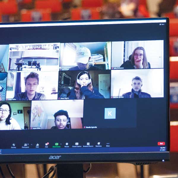 View of a laptop screen with a Zoom meeting in progress