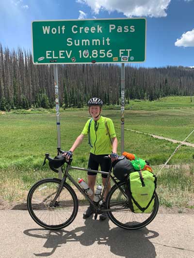 William Hooper and bike at the Wolf Creek Summit Pass