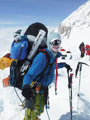 Will Wrigley resting between mountaineering 