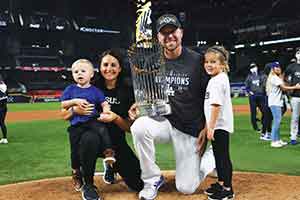Blake Treinen with his family holding the World Series trophy