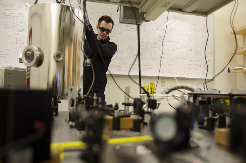 Assistant Professor of Physics Greg Ogin conducting precision optics research.