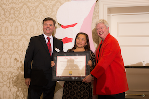 Custodian Ema Lopez-Ortiz (center), flanked by Walla Walla Valley Chamber of Commerce President Brian Duvall and Whitman President Kathleen Murray. Photo courtesy of Laurie’s Photography.