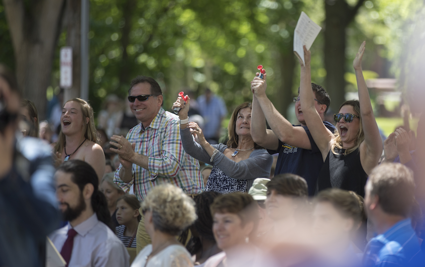 Family and friends cheer on the graduates during Whitman's Commencement ceremony on Sunday.
