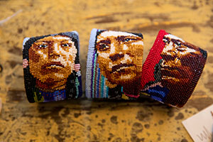 Beaded bracelets depict Native American portraits.