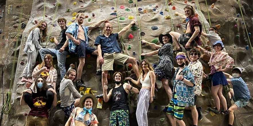 Members of the Whitman Climbing Team on the climbing wall