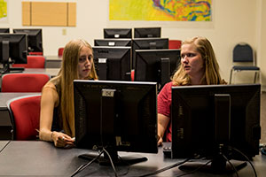 Hailey Kirlin '19 and Shelby Cutter working in computer lab.