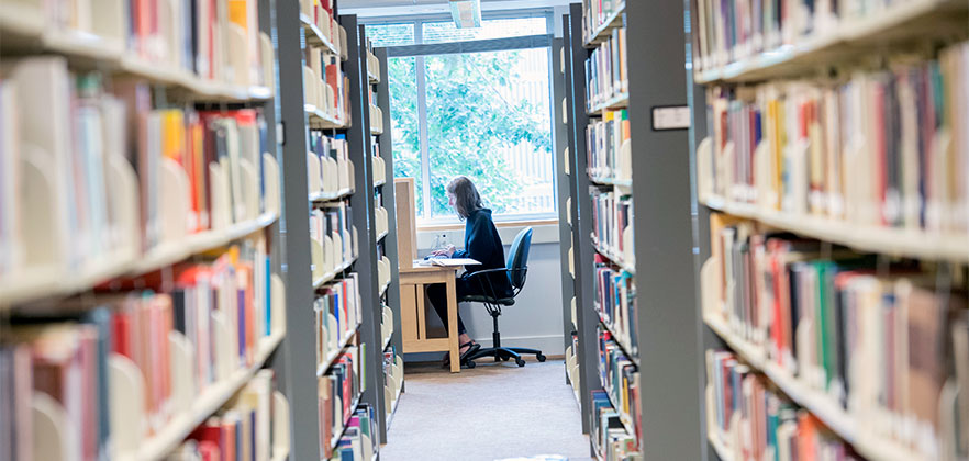 Student studying in Penrose Library