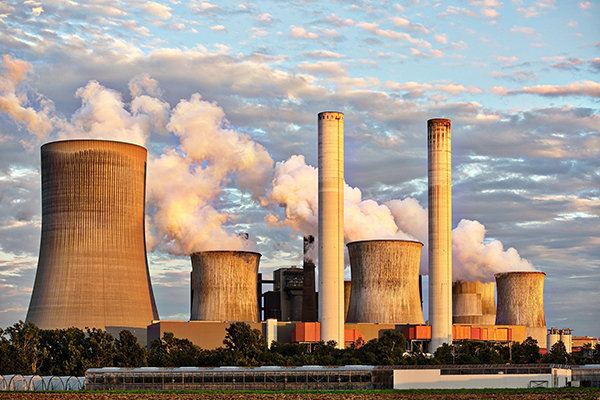 Factory smoke stacks.