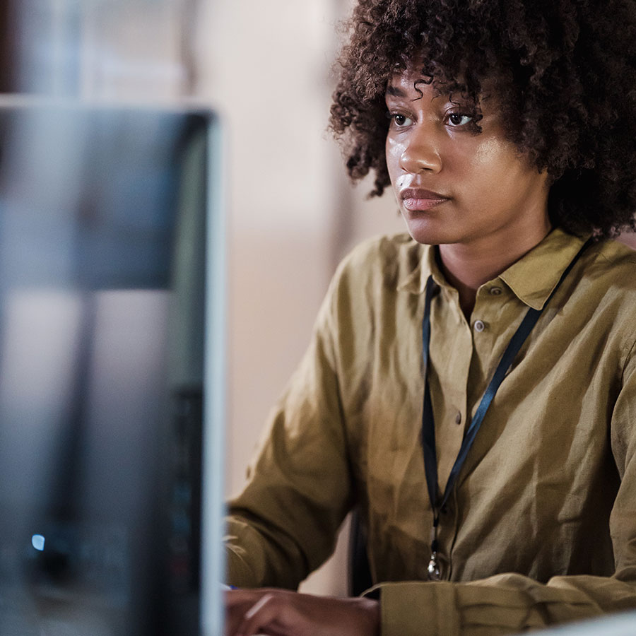 Person looking at a monitor.