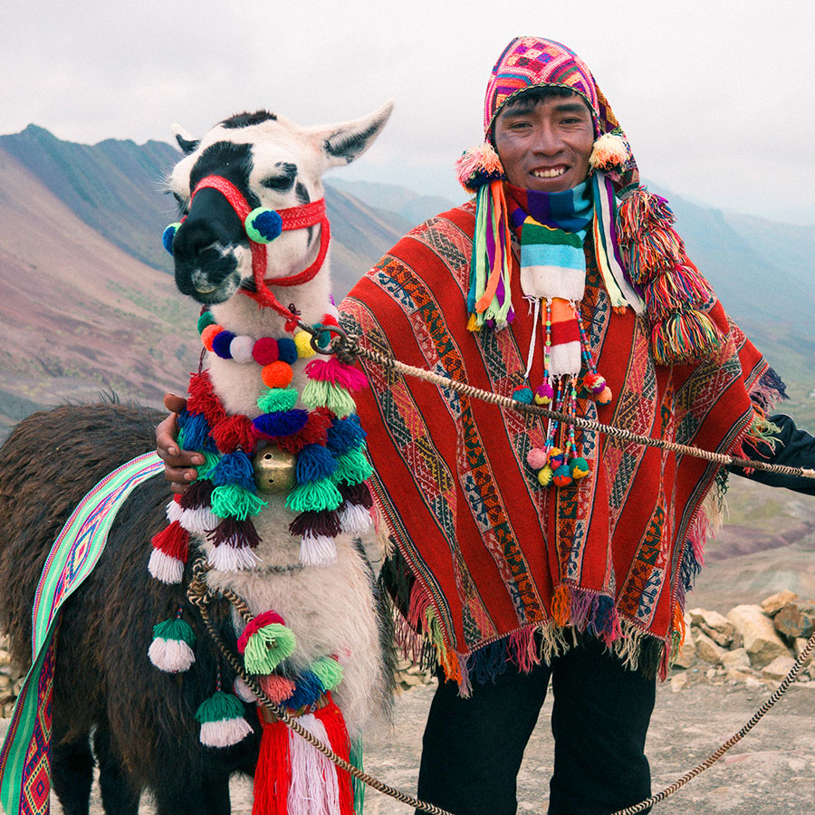 Sherpa outdoors with goat.