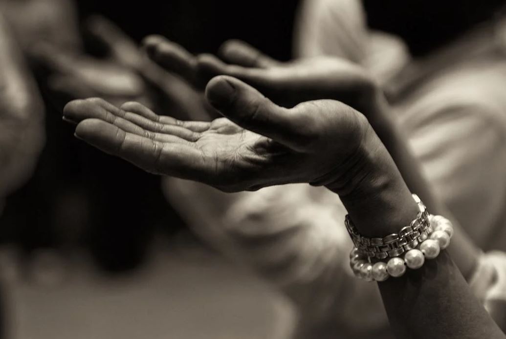 Open hands.