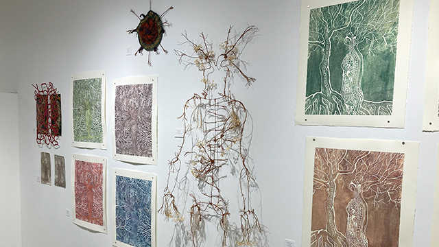 Several art pieces using thematic imagery of trees branches, tree roots and the human nervous system.