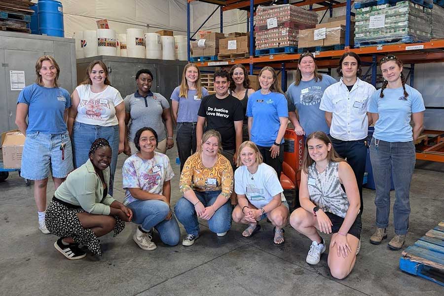 Jonathon Becker with a group of volunteers.
