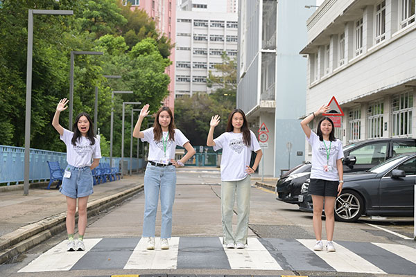 Mavie Pham posing on a crosswalk.