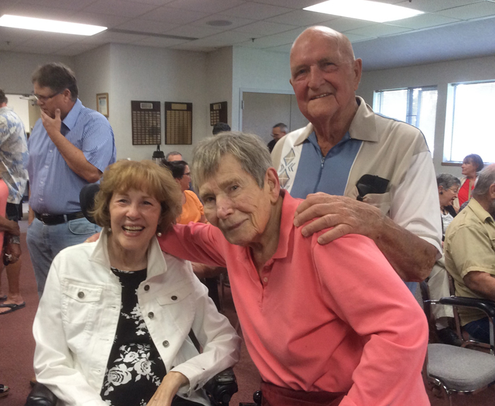 Carol Barker '80 is pictured with her PE teacher and coach, Charlotte Worth, and Dick Neher '53, long-time principal of Wa-Hi.

