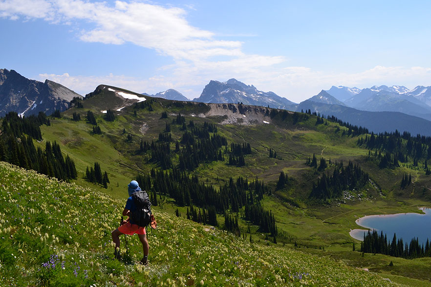 Perspective of a student in a mountainscape from behind