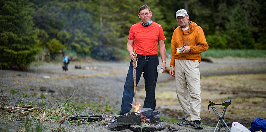 Alan and Andy Dappen stand on the shores of Alaska along the inland passage in 2017.