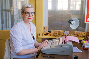 Sophie Johnson sitting at desk