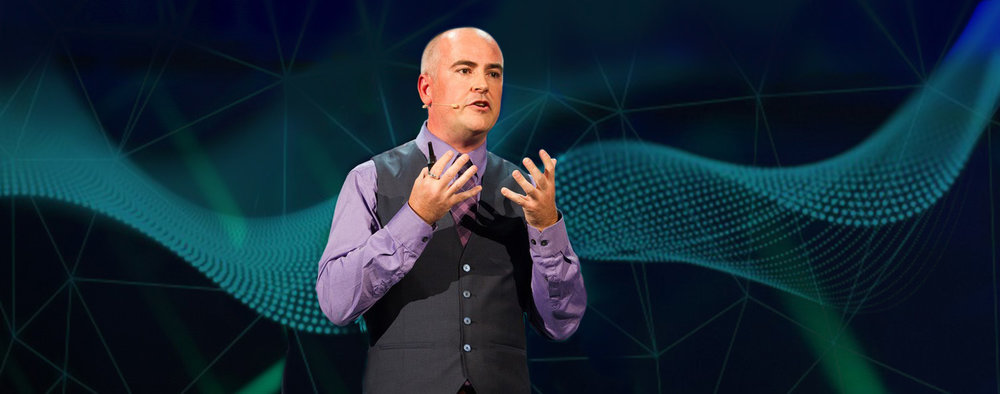 The bald futurist speaking about artificial intelligence 