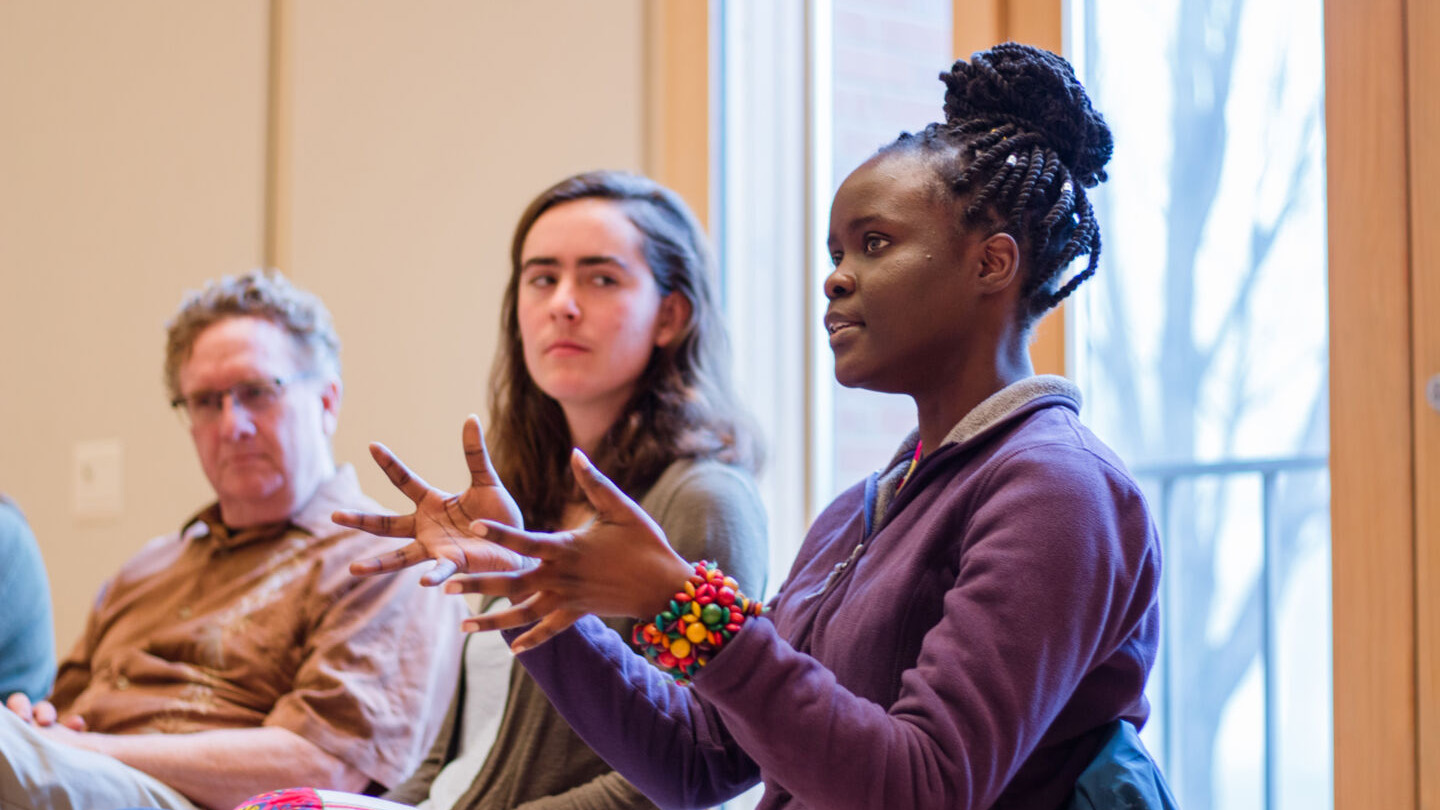 Students and alumni discussing