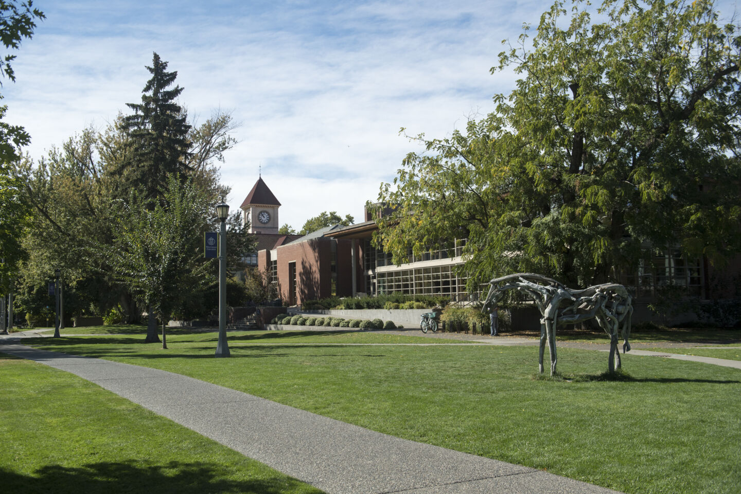 memorial building on whitman college campus at sunrise