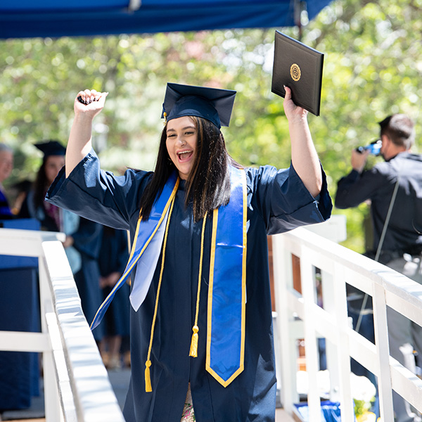 Student celebrating graduating at commencement