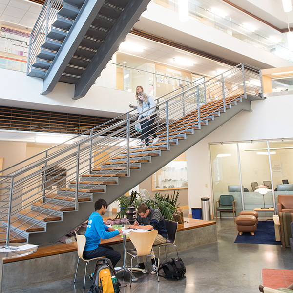 Whitman students studying in the atrium of the Hall of Science