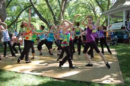 Another Picture of Tie-Dye Shirted dancing in the park