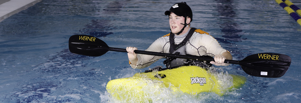 Kevin Garder kayaking in the Harvey pool