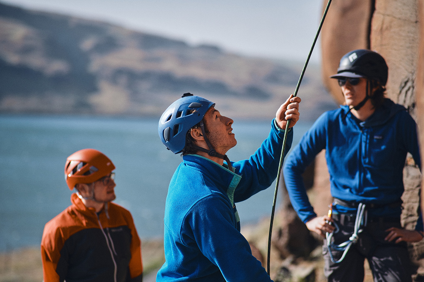 Whitman student getting ready to rock climb