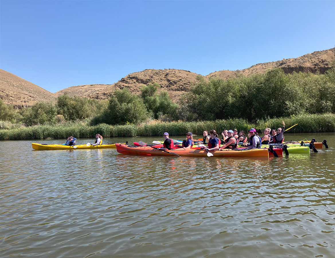 Whitman Women's Basketball team flatwater kayaking