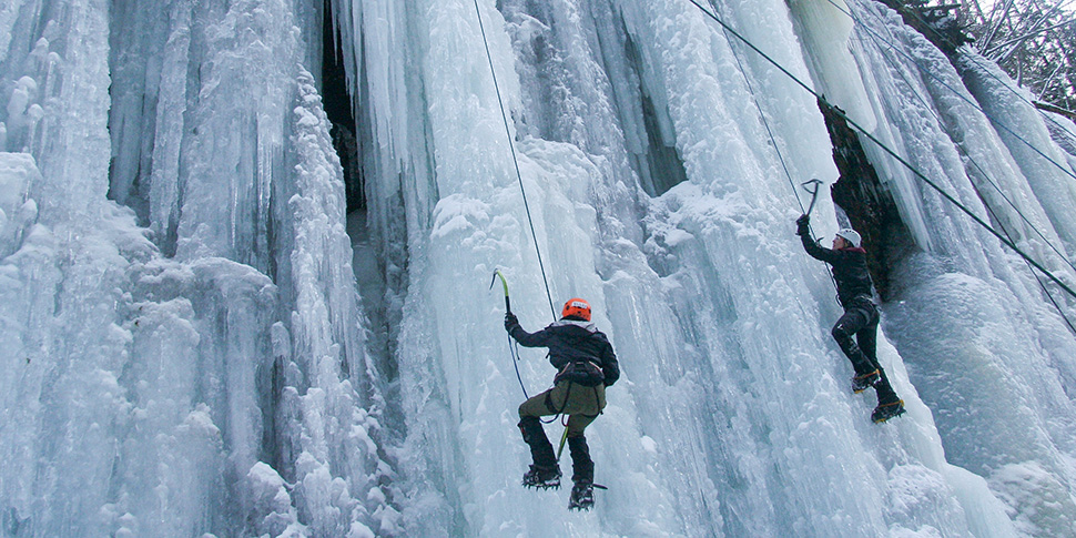 Whitman community member ice climbing.