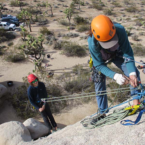 A rock climber practicing climbing skills.