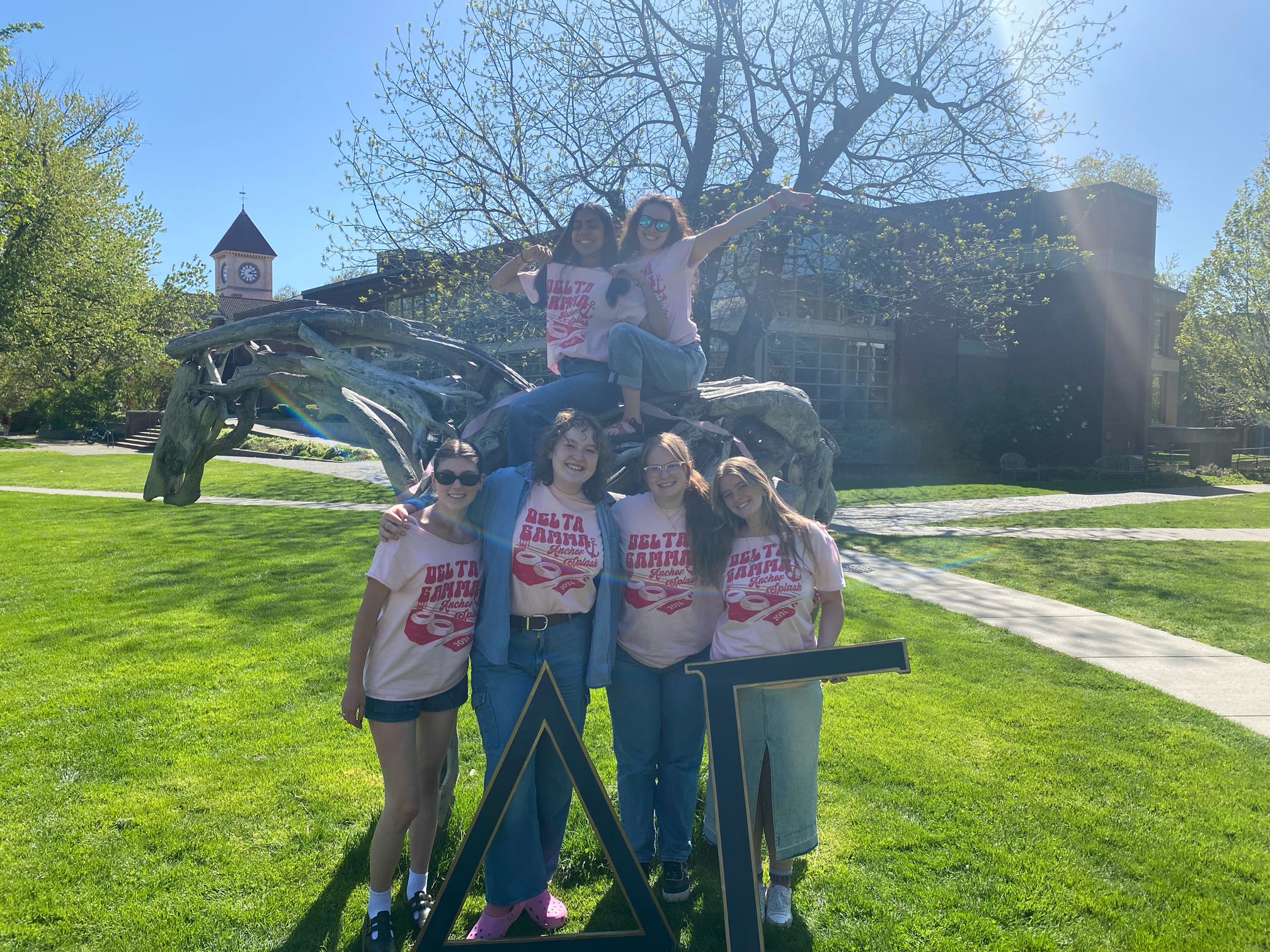 A group of students on the Styx sculpture.