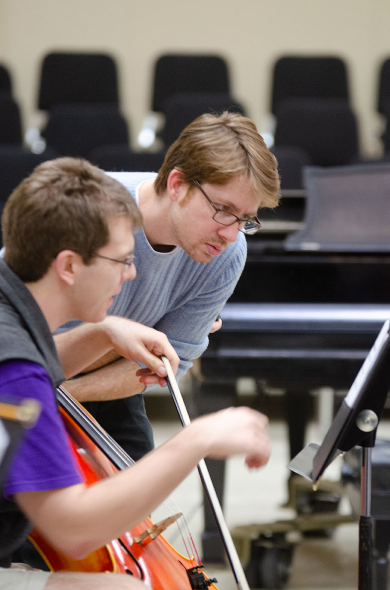 A student and teacher discuss a piece of music