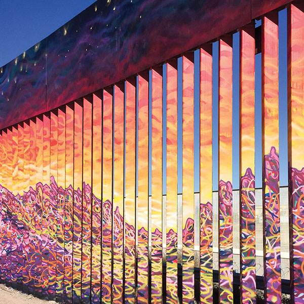 Colorful art painted on the border wall