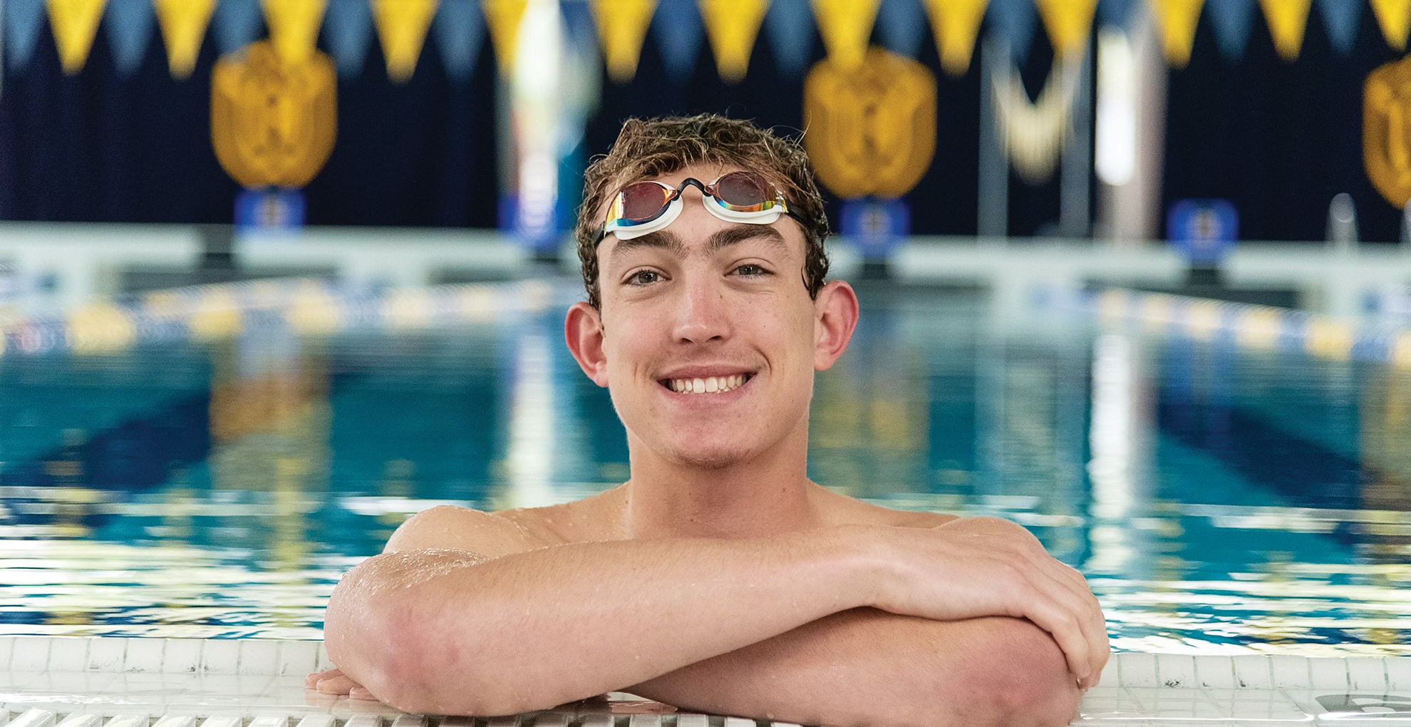 Tanner Filion ’23 smiling in the pool.