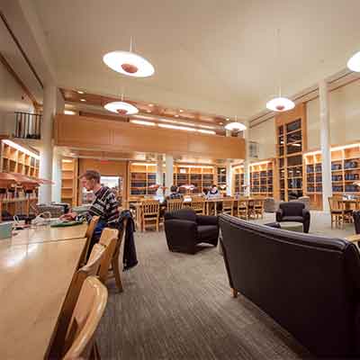 A student studying in the "quiet room" at Penrose Library.