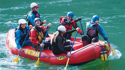 Students white water rafting.