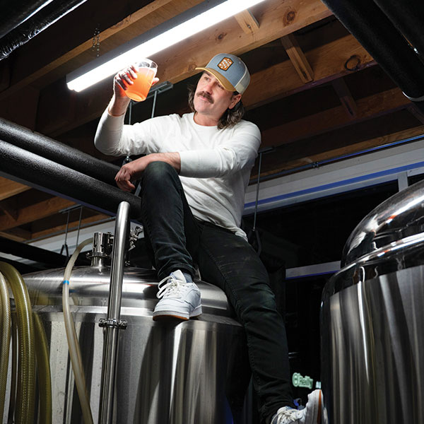 Zachary Lough making cider.