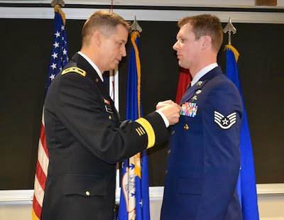 Owen Unbehaun receiving the Bronze Star