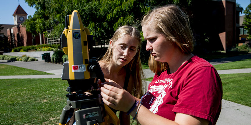 Hailey Kirlin '19 and Shelby Cutter '19 set viewpoints on a GPS system.