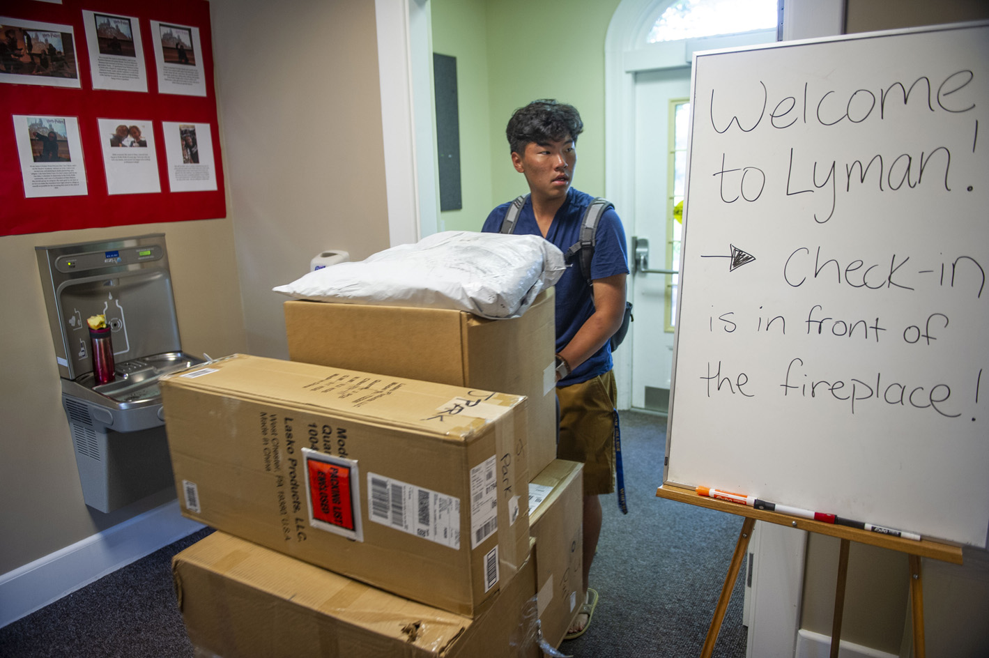 Student moves big boxes