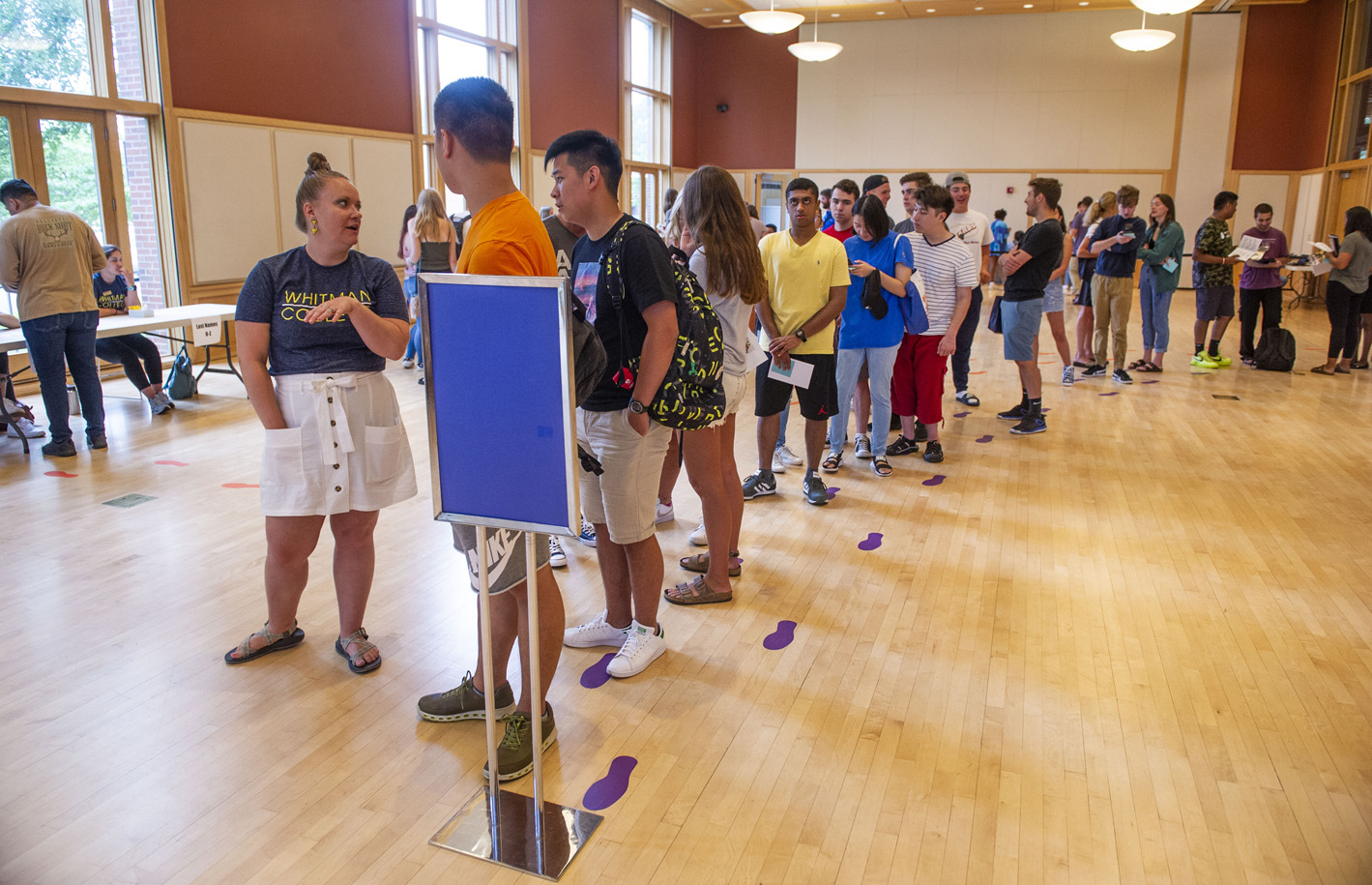  students wait in line for Student I.D. cards